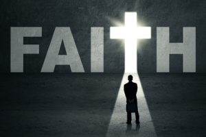 Rear view of young businessman looking at faith door